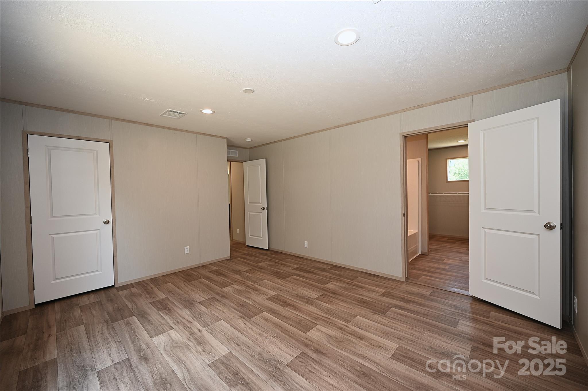 1213 Renno Road Clinton, SC 29325 - Photo 7 of 17 a view of hallway with wooden floor