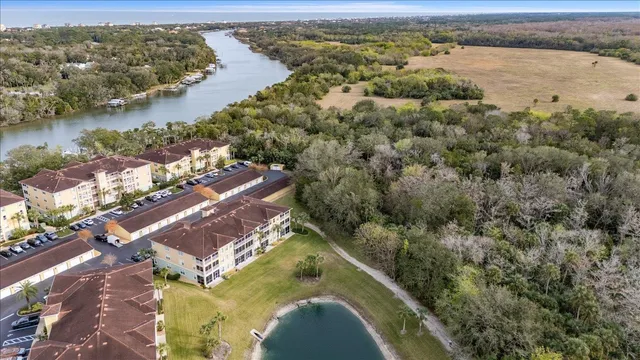 an aerial view of a house with outdoor space