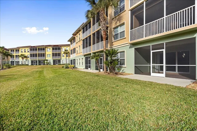 a view of an apartment with many windows