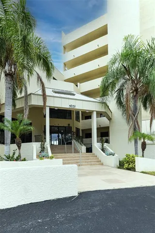 a view of swimming pool from a lake view