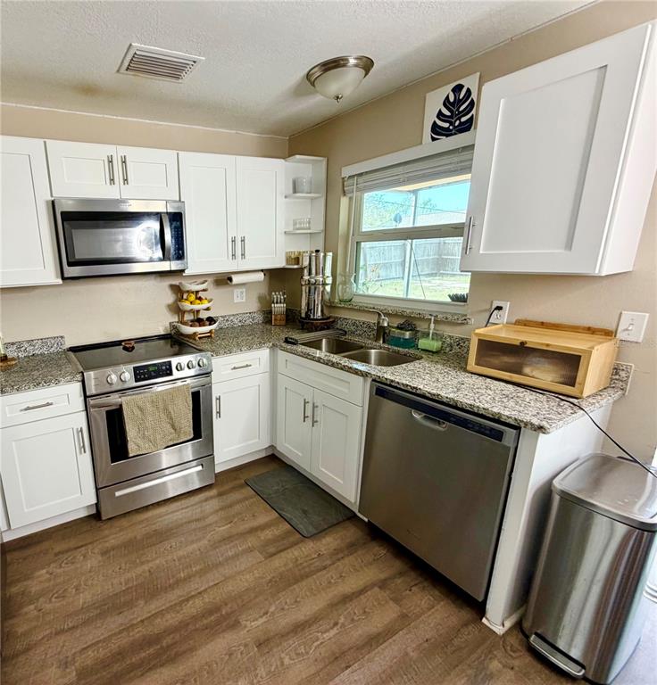 7974 Avenal Loop New Port Richey, FL 34655 - Photo 7 of 23 Gallery Image 7