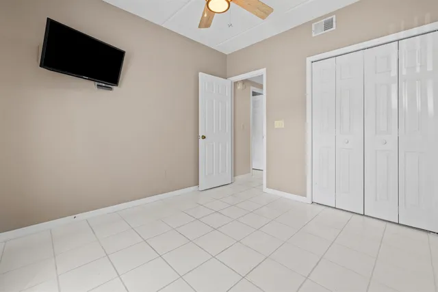 a view of a livingroom with a flat screen tv