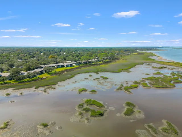 a view of a lake with beach