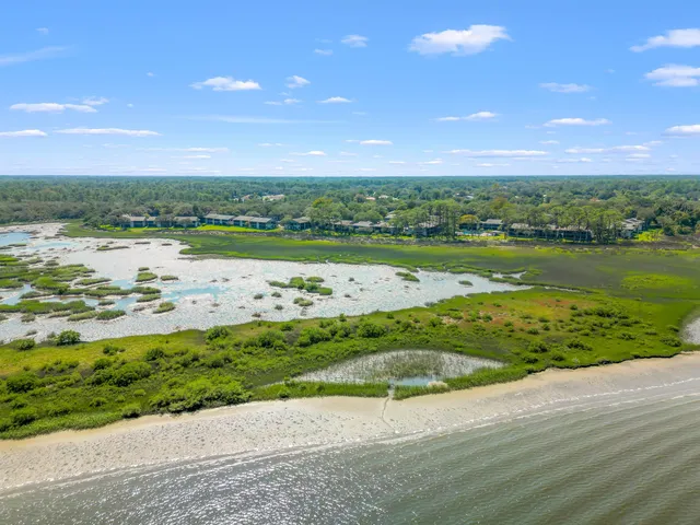 a view of a lake with a big yard