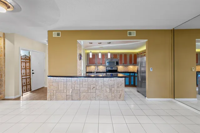 a view of a living room with furniture