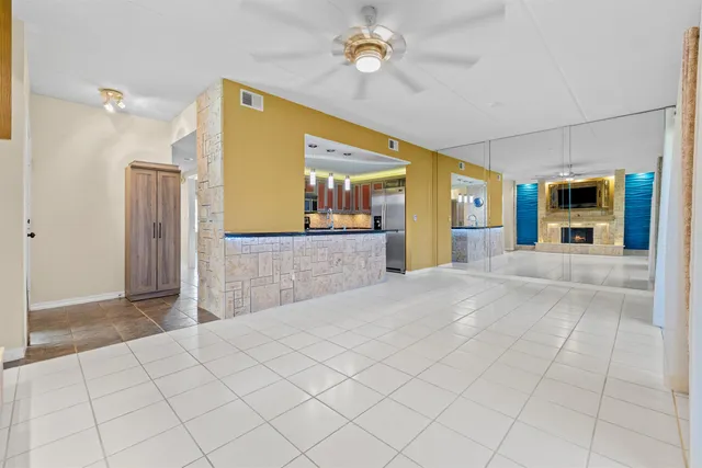 a view of livingroom with kitchen view