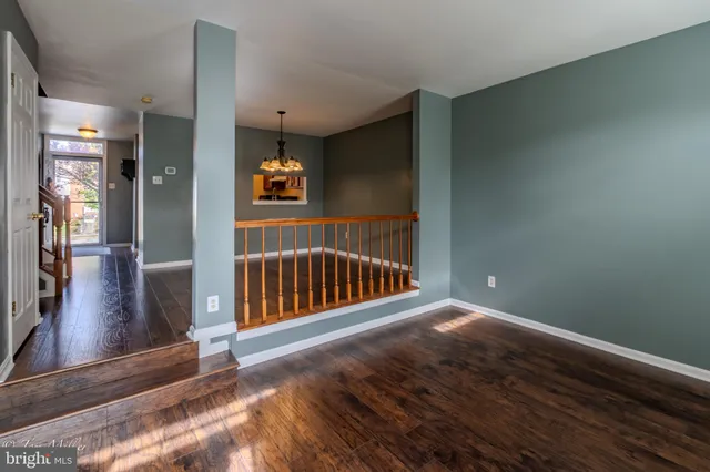 a view of a hallway view with staircase