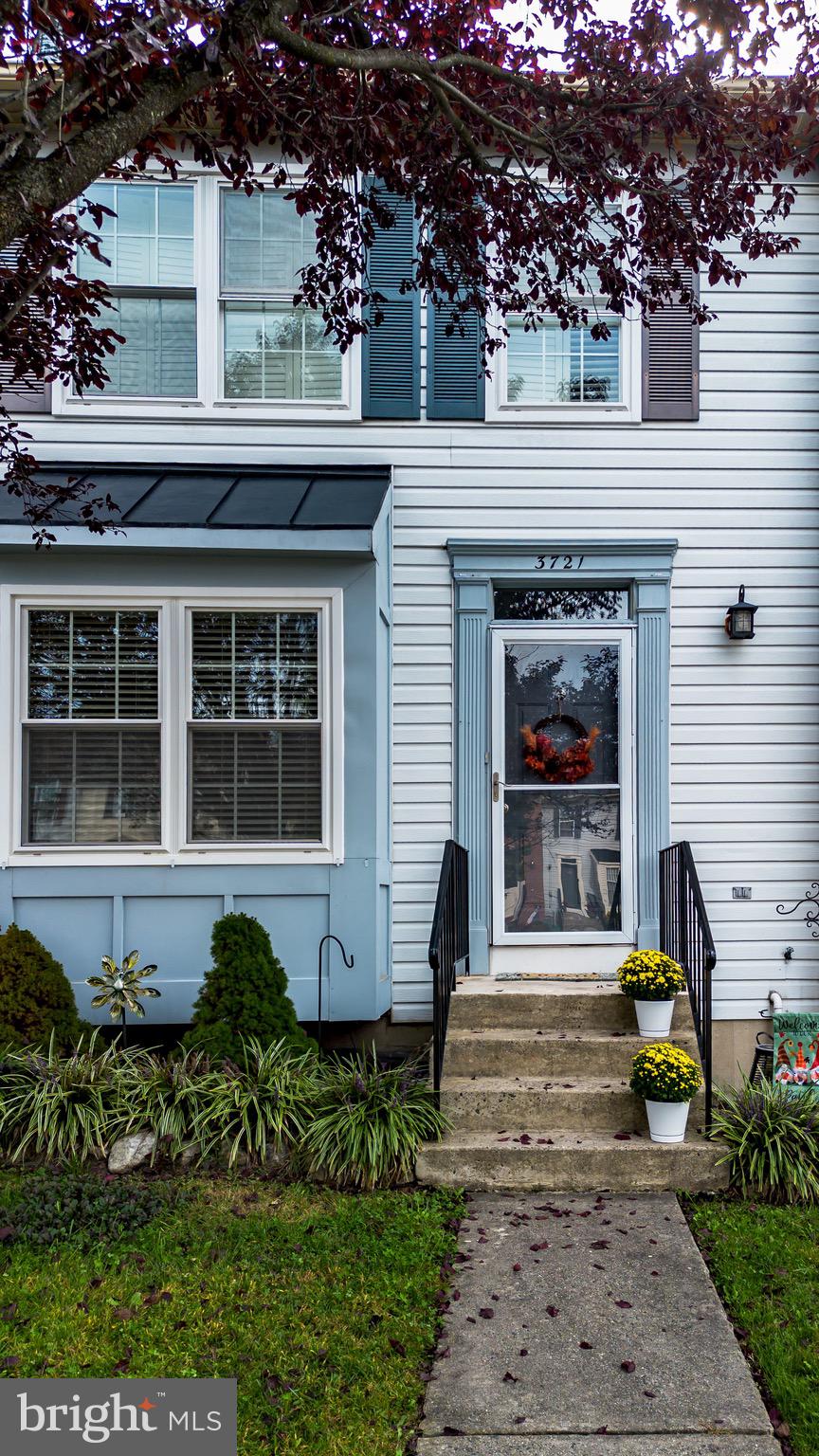 3721 Foxford Stream Road Nottingham, MD 21236 - Photo 4 of 48 a front view of a house with a garden