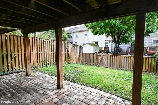 a view of small space with wooden deck