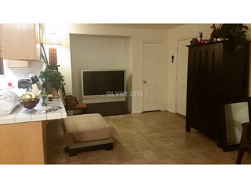 101 Luna Way, Unit 252 Las Vegas, NV 89145 - Photo 14 of 14 Property Photo. TV visible from Kitchen, Open Floor Plan