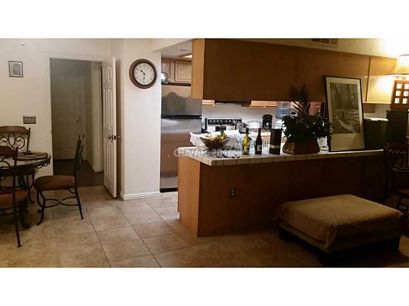 101 Luna Way, Unit 252 Las Vegas, NV 89145 - Photo 2 of 14 Property Photo. Open Kitchen with Breakfast Bar