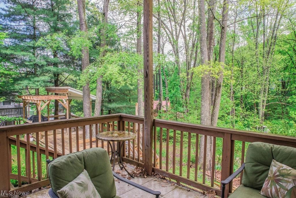 4254 Doral Road Southwest Carrollton, OH 44615 - Photo 19 of 46 Wooden deck featuring a playground