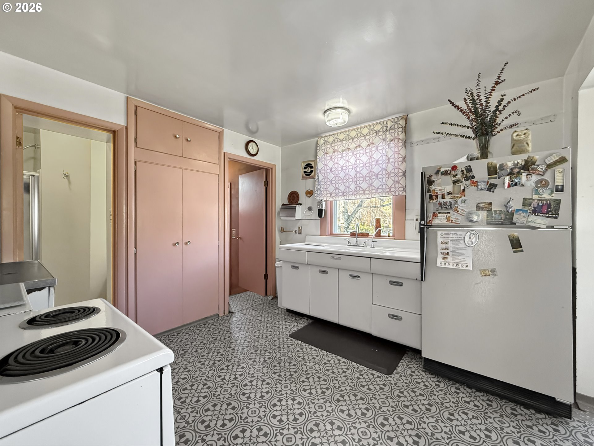 2291 2nd Street Baker City, OR 97814 - Photo 15 of 48 a kitchen with a refrigerator and a stove
