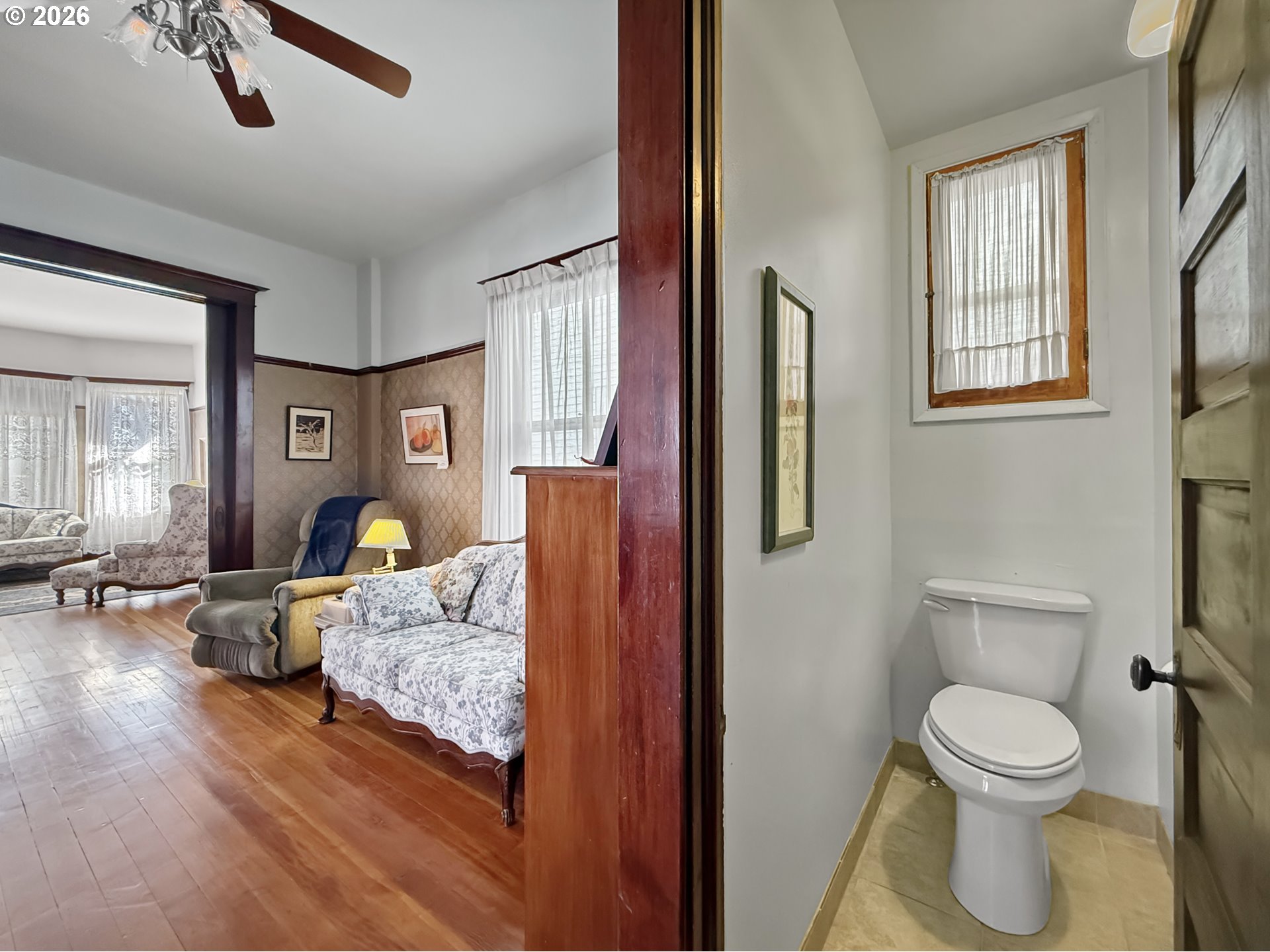 2291 2nd Street Baker City, OR 97814 - Photo 17 of 48 a living room with furniture and a toilet