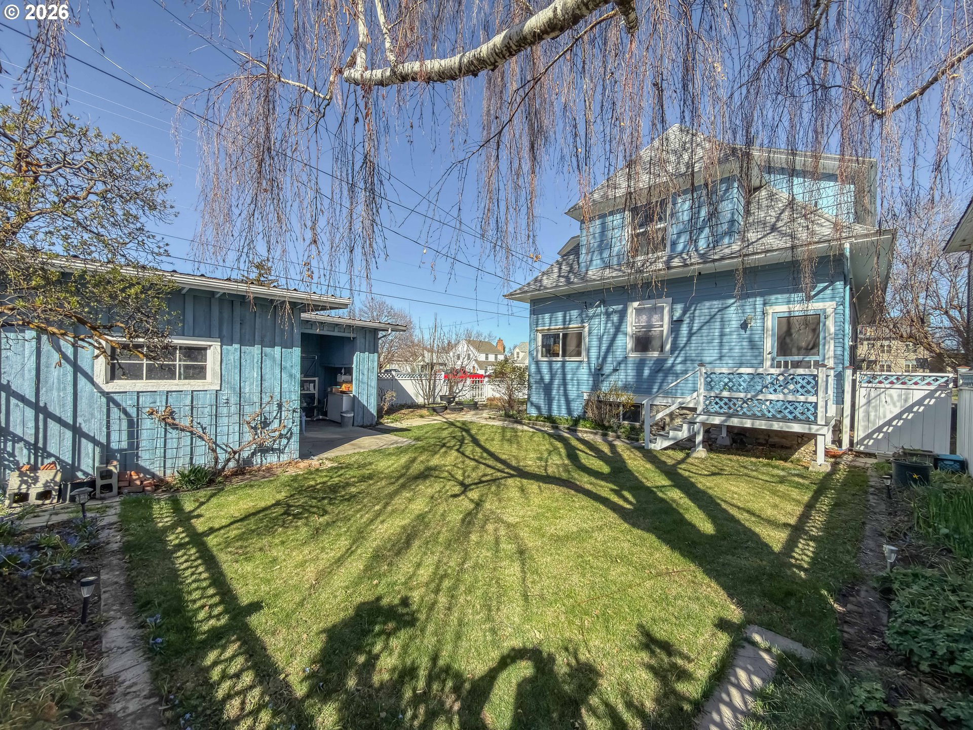 2291 2nd Street Baker City, OR 97814 - Photo 43 of 48 a view of a house with large trees