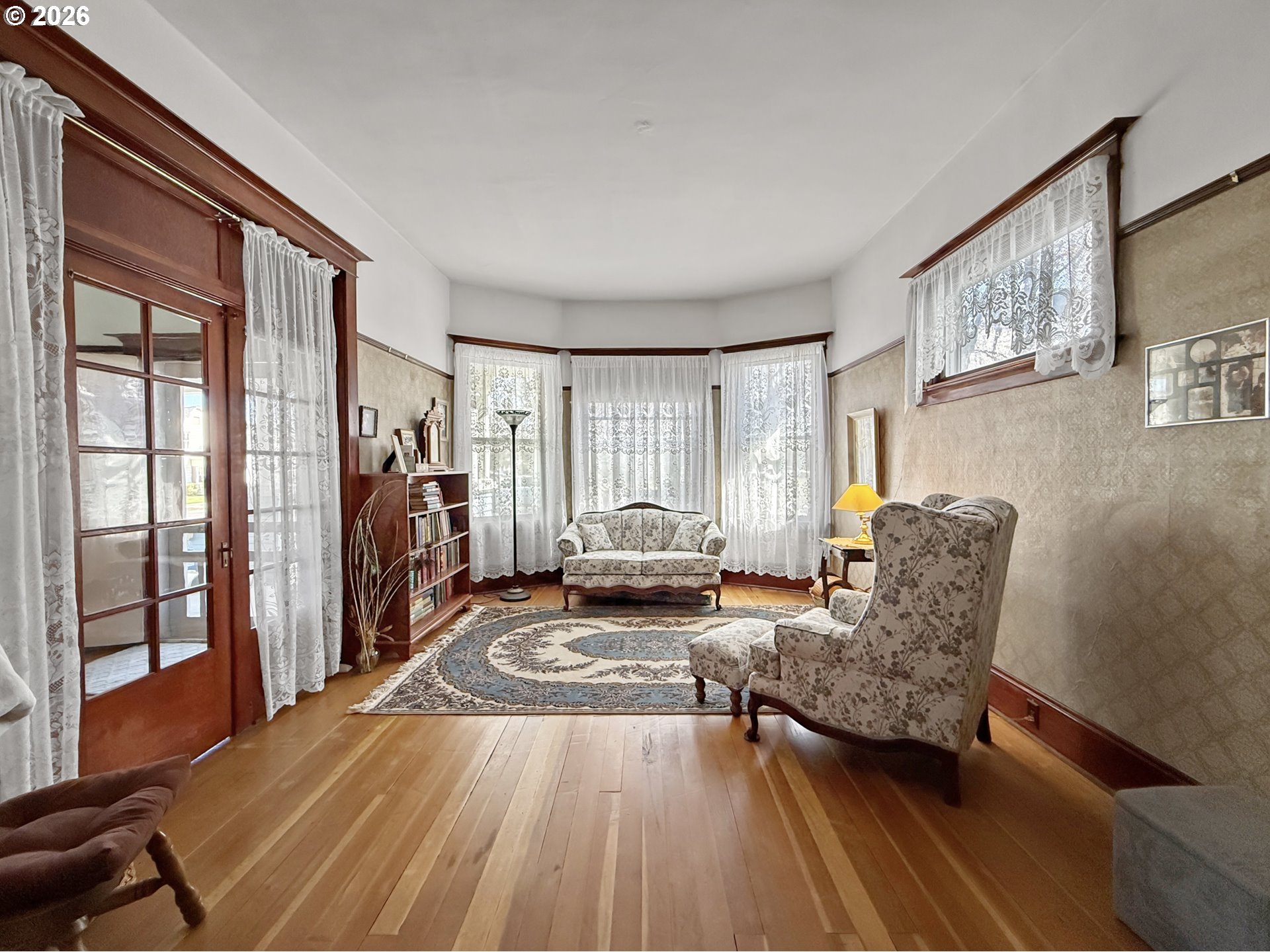 2291 2nd Street Baker City, OR 97814 - Photo 6 of 48 a bedroom with furniture and a large window