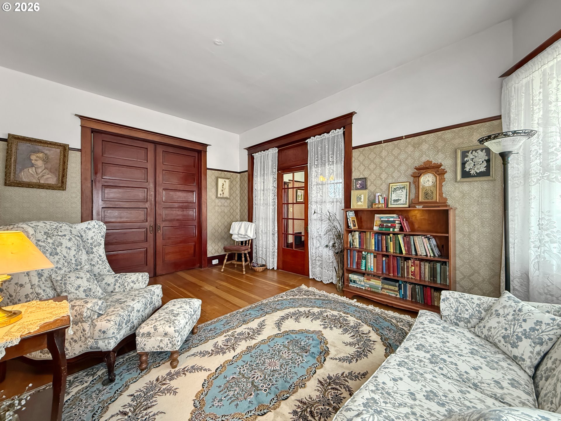 2291 2nd Street Baker City, OR 97814 - Photo 7 of 48 a bedroom with a bed a couch and a window