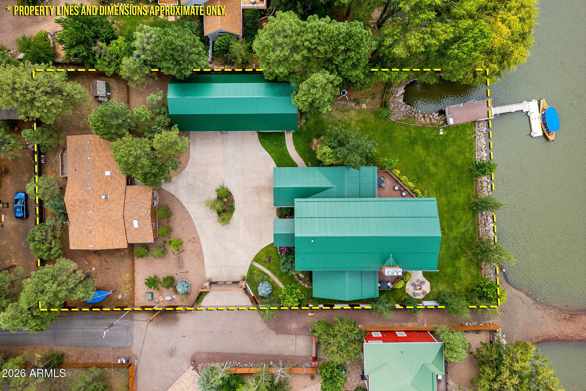 758 Southlake Road Lakeside, AZ 85929 - Photo 88 of 95 an aerial view of a house with a garden and a yard