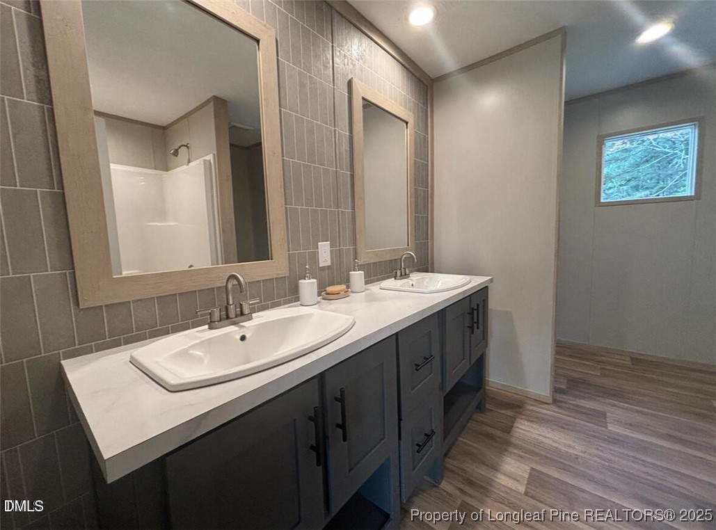 351 Page Road Godwin, NC 28344 - Photo 11 of 19 a bathroom with 2 sink and a mirror