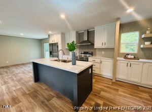 351 Page Road Godwin, NC 28344 - Photo 6 of 19 a kitchen with a sink cabinets and window