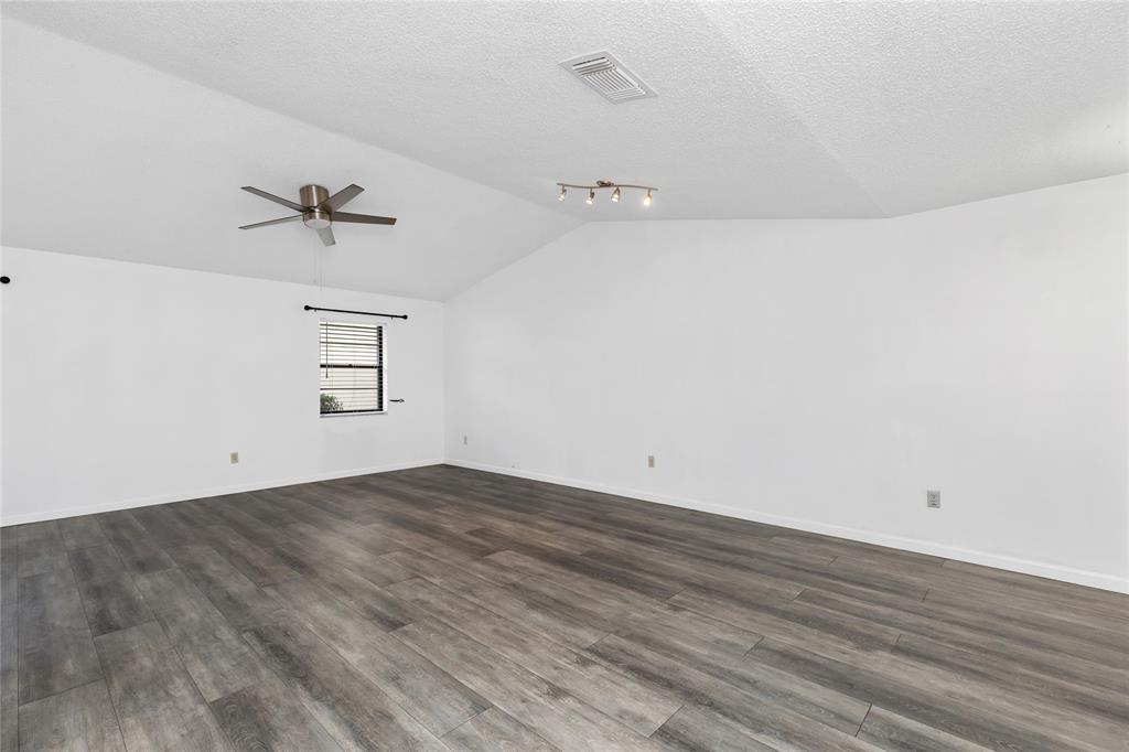 9114 Southwest 20th Street, Unit B Boca Raton, FL 33428 - Photo 14 of 36 wooden floor in an empty room