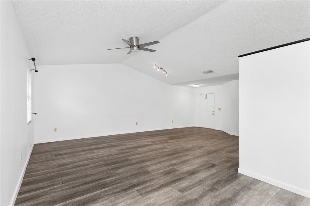 9114 Southwest 20th Street, Unit B Boca Raton, FL 33428 - Photo 15 of 36 a view of a room with wooden floor