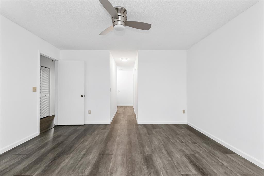 9114 Southwest 20th Street, Unit B Boca Raton, FL 33428 - Photo 19 of 36 a view of empty room with wooden floor