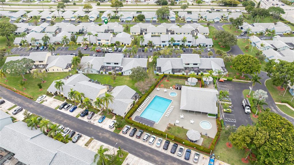 9114 Southwest 20th Street, Unit B Boca Raton, FL 33428 - Photo 34 of 36 an aerial view of a house with a swimming pool