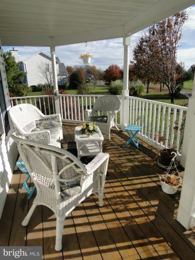 5979 Ketch Road Prince Frederick, MD 20678 - Photo 6 of 11 a view of a patio with iron chairs