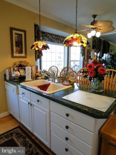 5979 Ketch Road Prince Frederick, MD 20678 - Photo 7 of 11 a bathroom with a sink and a mirror