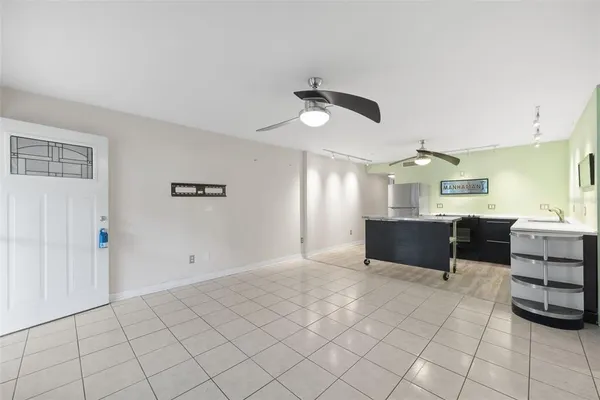 a view of kitchen with furniture and window