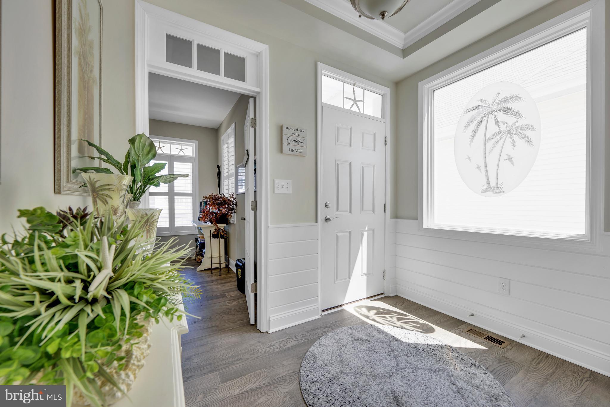 11886 Haslet Road Lewes, DE 19958 - Photo 21 of 60 a entryway with furniture and a potted plant