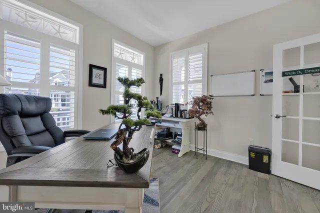 a bedroom with a bed and a television