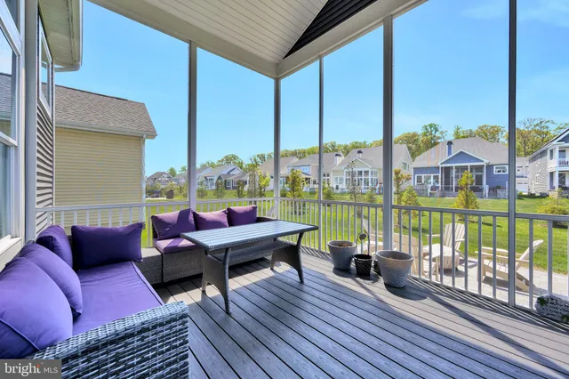 a living room with furniture fireplace and a flat screen tv