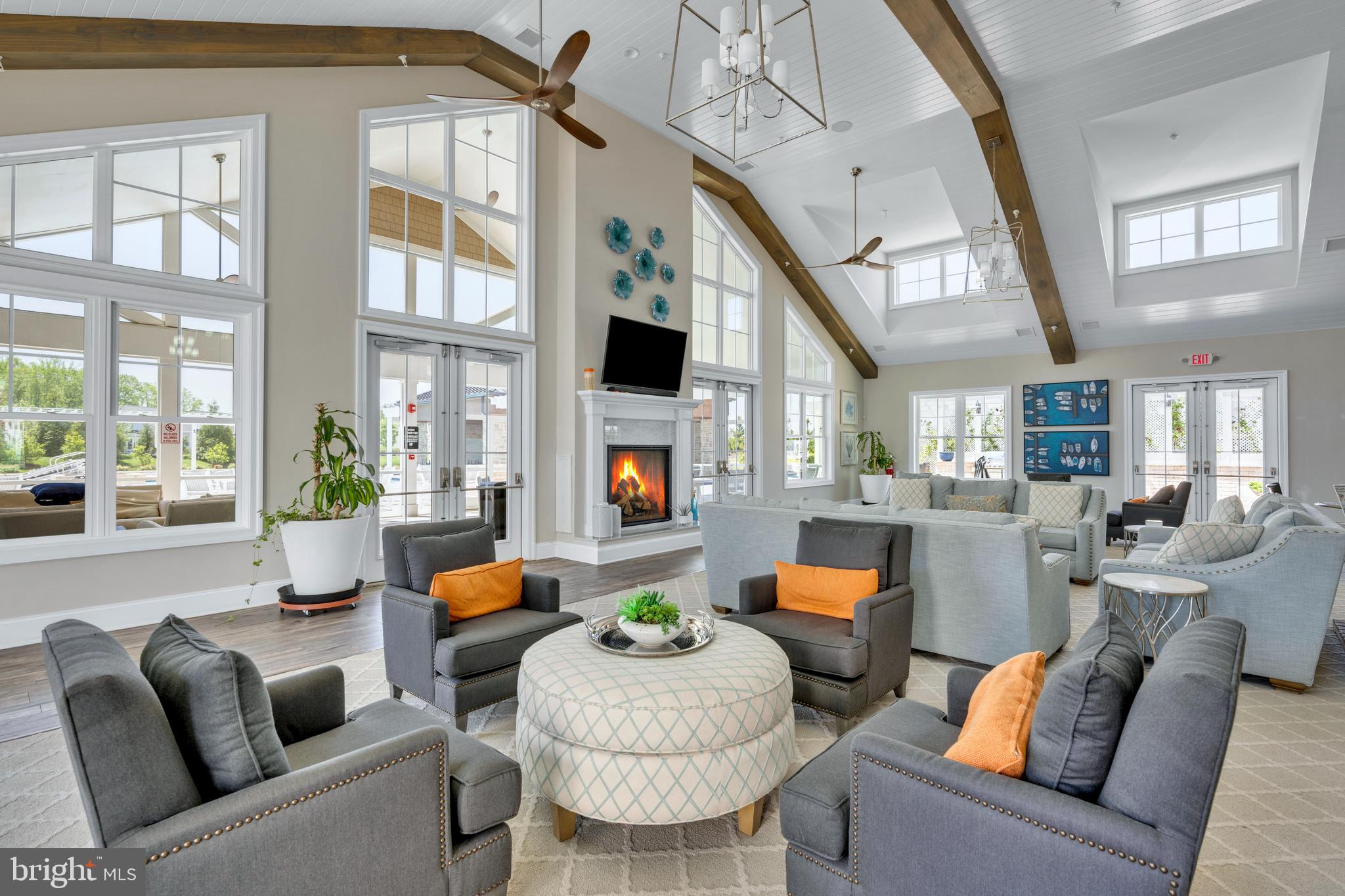 11886 Haslet Road Lewes, DE 19958 - Photo 51 of 60 a living room with furniture and a large window