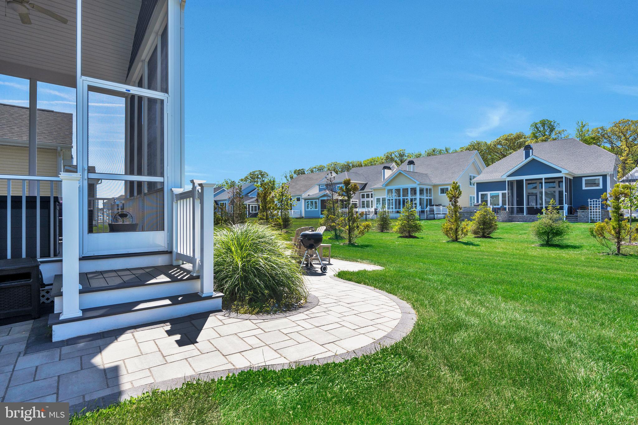 11886 Haslet Road Lewes, DE 19958 - Photo 10 of 60 a front view of a house with garden