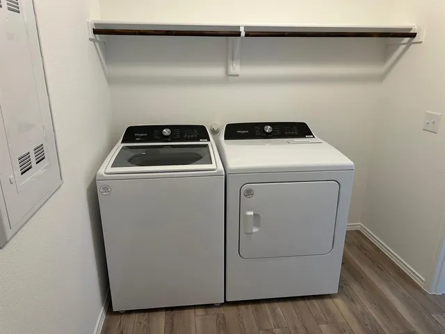 a utility room with dryer and washer