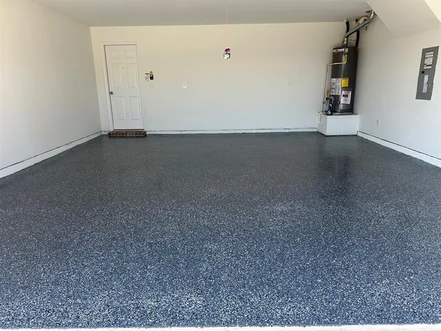 a view of a livingroom with wooden floor and window