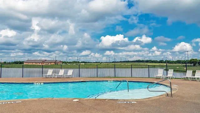 a view of a lake with a garden
