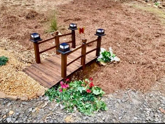 a view of a bench in front of house