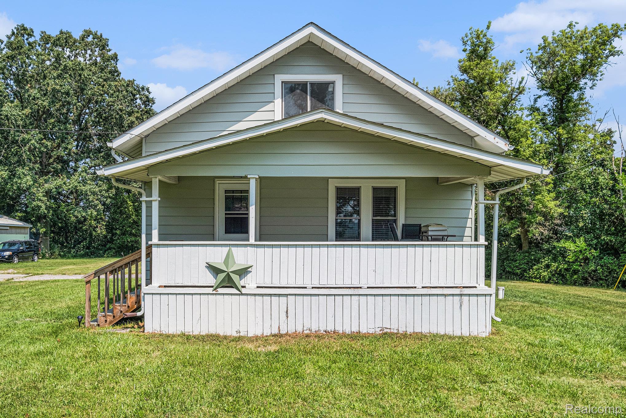 10262 Gd Blanc Road Gaines, MI 48436 - Photo 2 of 24 A charming farmhouse situated on just over a half acre