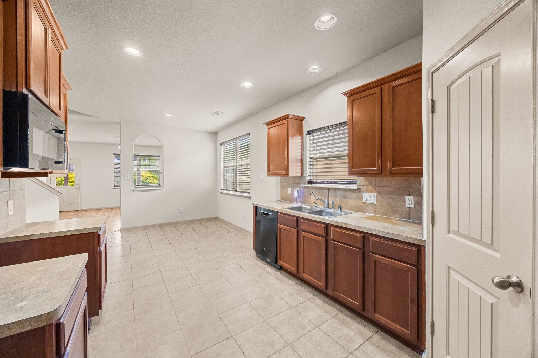 3606 Canvasback Lane Houston, TX 77047 - Photo 6 of 29 The kitchen seamlessly connects to the dining and living spaces, making hosting family and friends effortless.