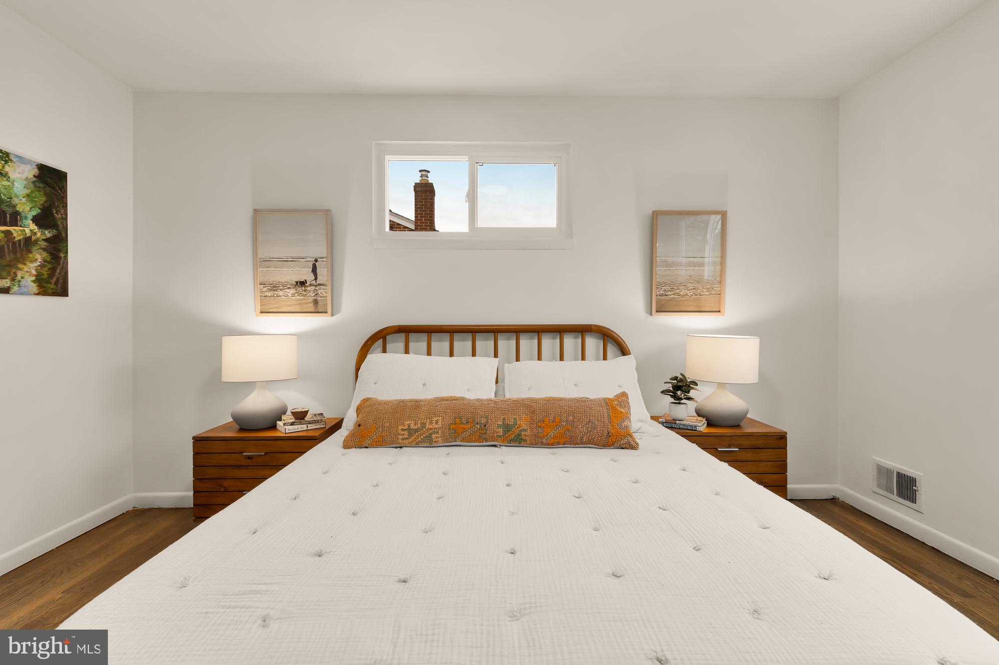 405 Irwin Street Silver Spring, MD 20901 - Photo 22 of 39 a bedroom with a bed and night stand