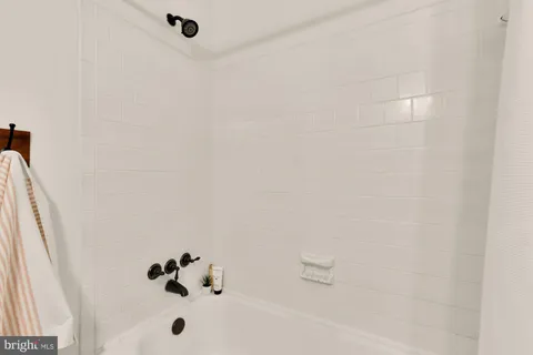 a bathroom with a bathtub