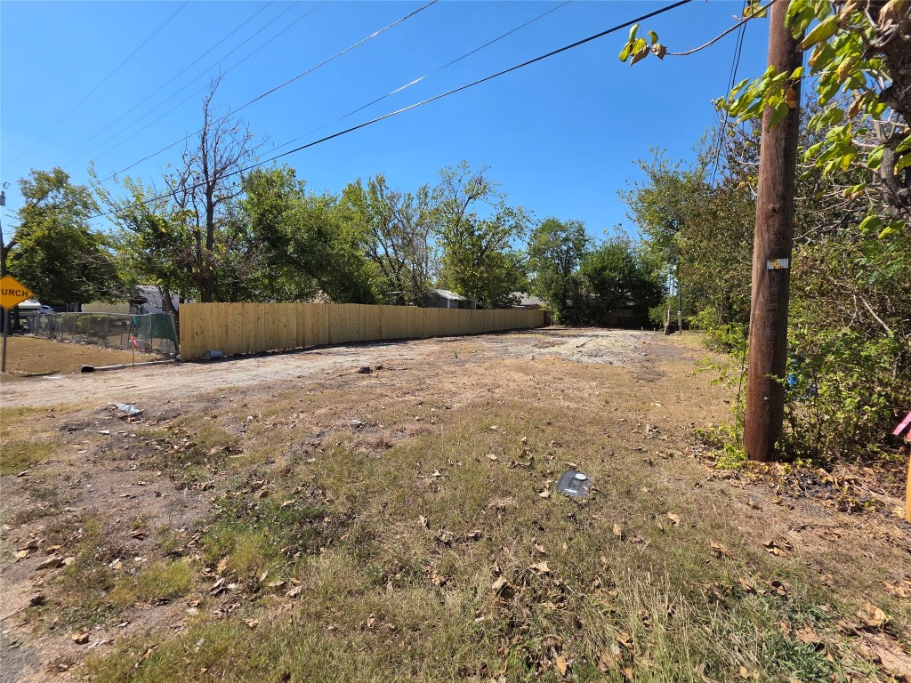 112 2nd Avenue Taylor, TX 76574 - Photo 3 of 5 a backyard of a house with lots of green space