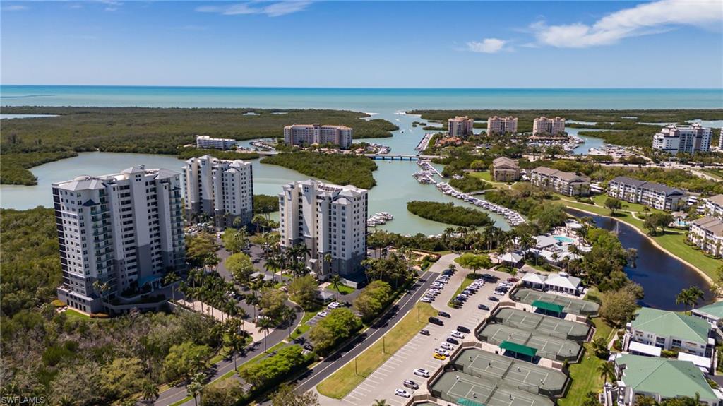 425 Cove Tower Drive, Unit 502 Naples, FL 34110 - Photo 17 of 18 a view of a city with an ocean view