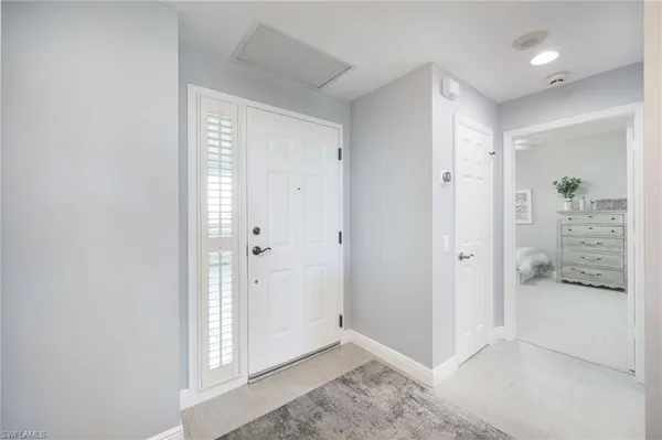 a view of livingroom with kitchen