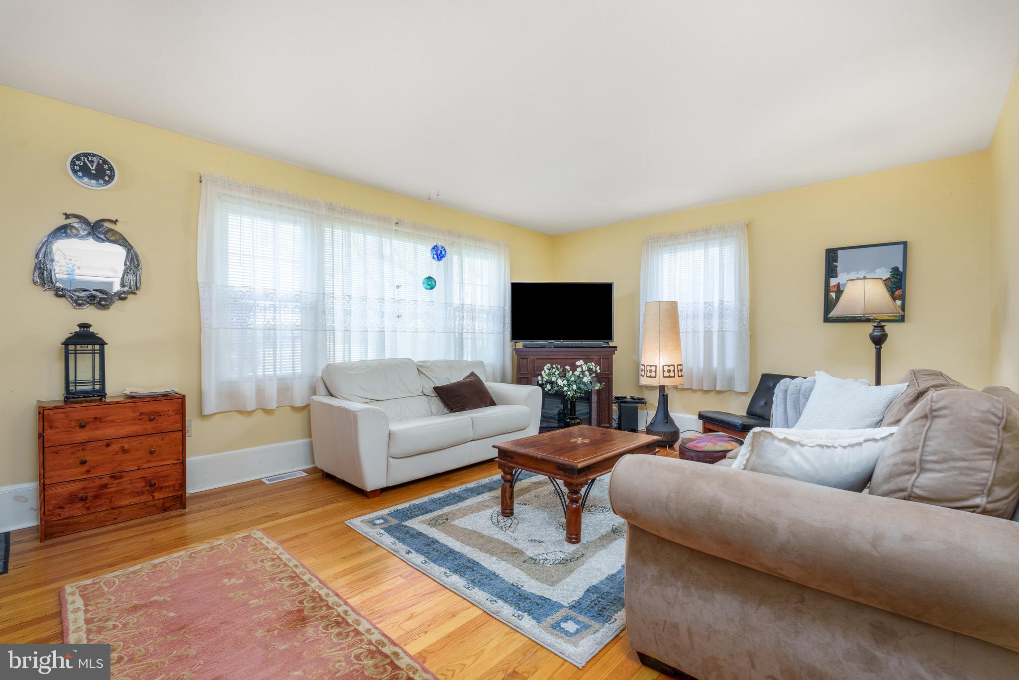 121 Devonshire Road Wilmington, DE 19803 - Photo 13 of 31 a living room with furniture and a flat screen tv