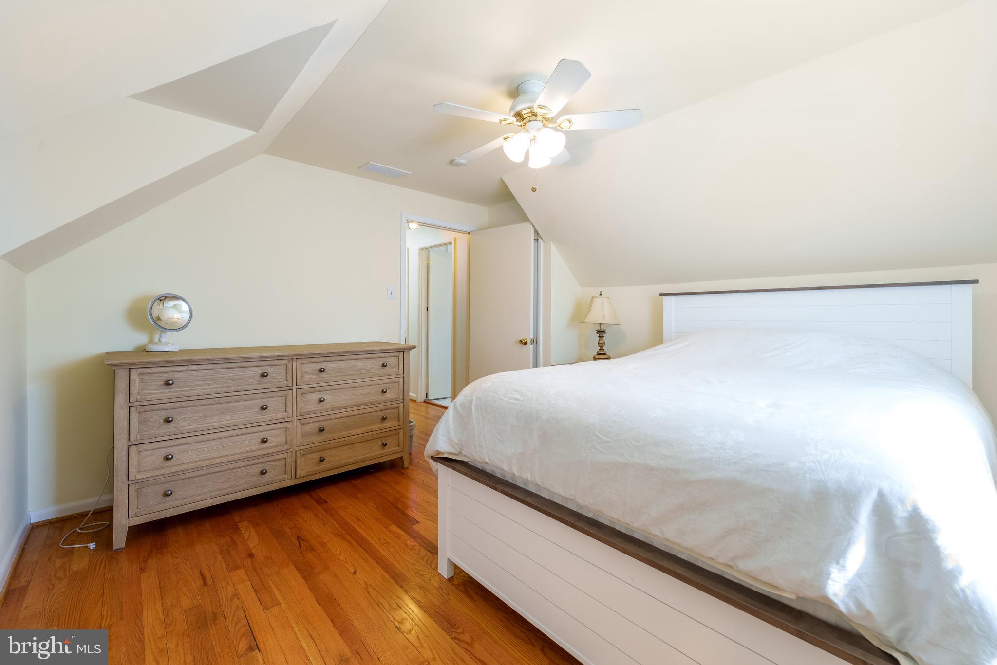 121 Devonshire Road Wilmington, DE 19803 - Photo 19 of 31 a bedroom with a bed and a chandelier