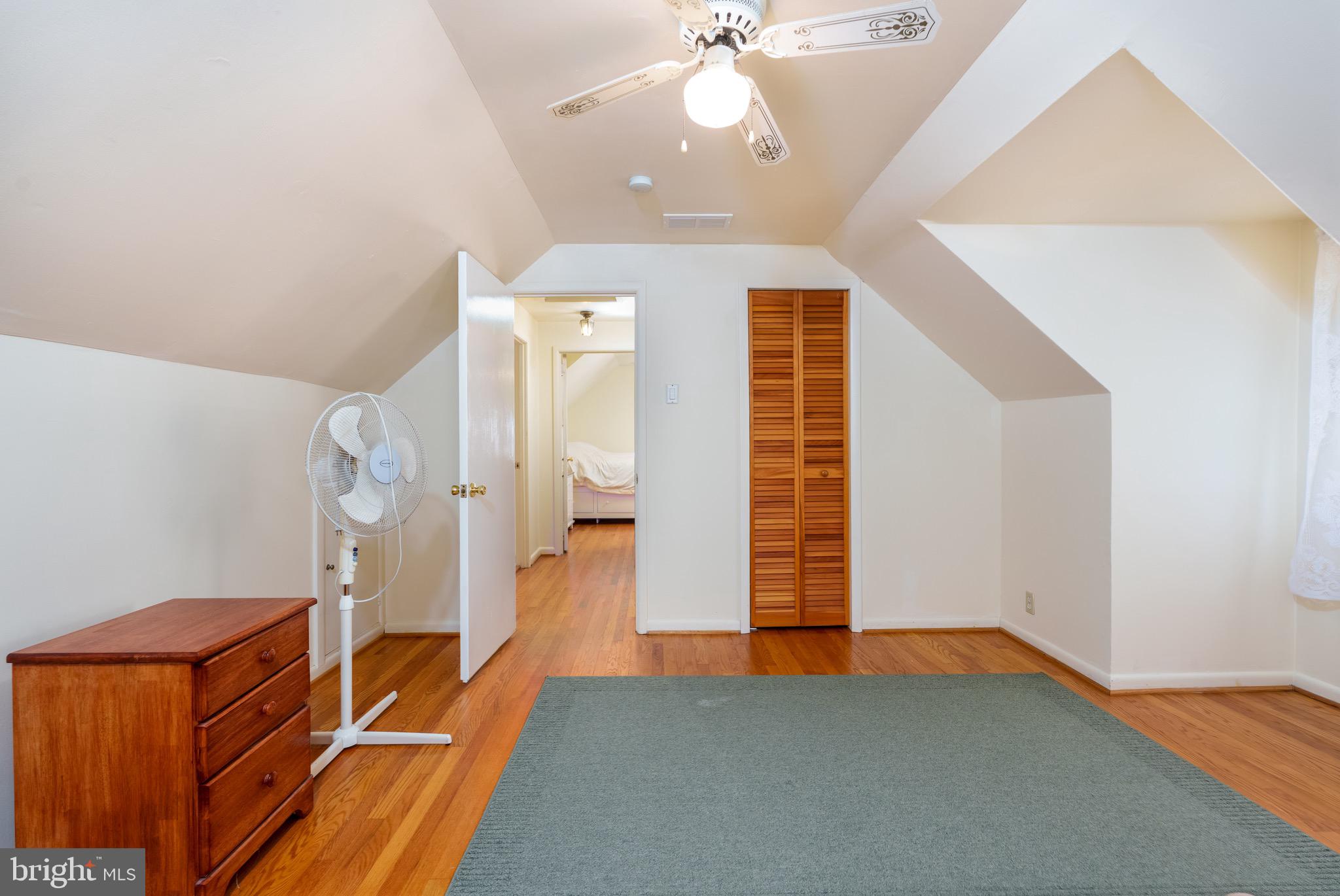 121 Devonshire Road Wilmington, DE 19803 - Photo 22 of 31 an empty room with wooden floor and staircase